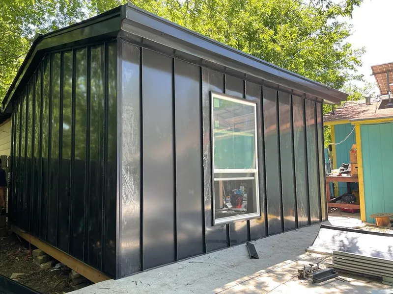 Black standing seam metal wall panels for Metal Roof Installation in Massanetta Springs