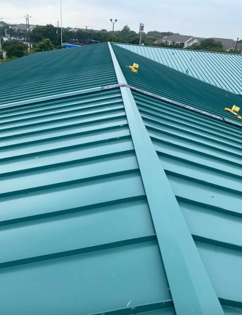 Green commercial metal roof ridge and valley for Metal Roof Repair in Massanetta Springs